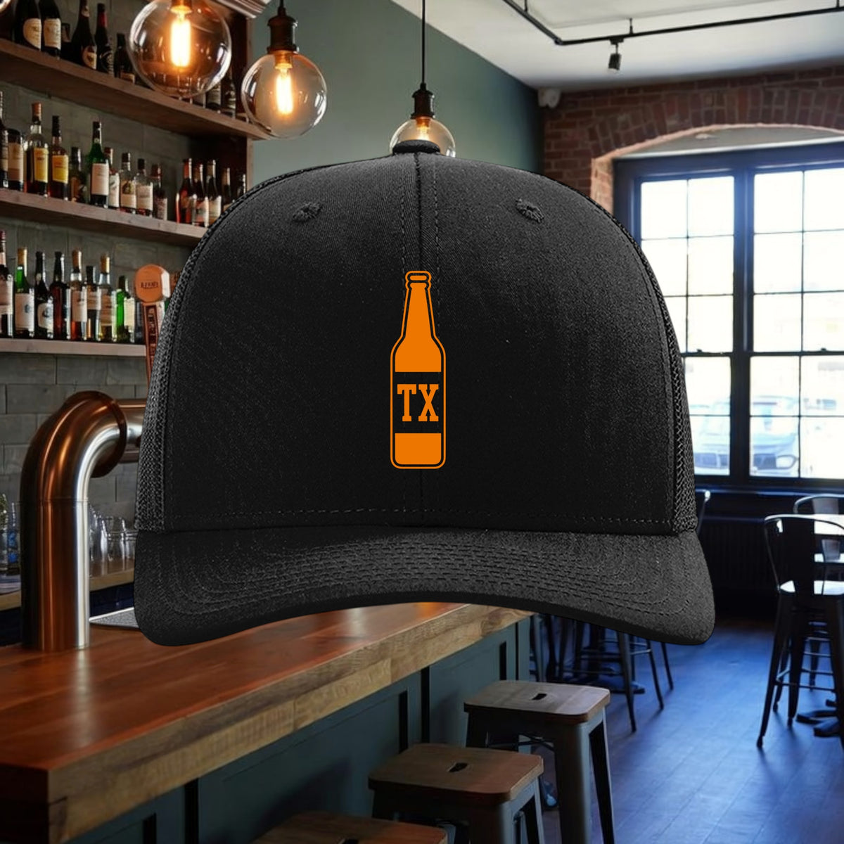Better Grab A Beer TX Bottle Austin trucker hat in black with an orange beer bottle graphic and snapback closure.