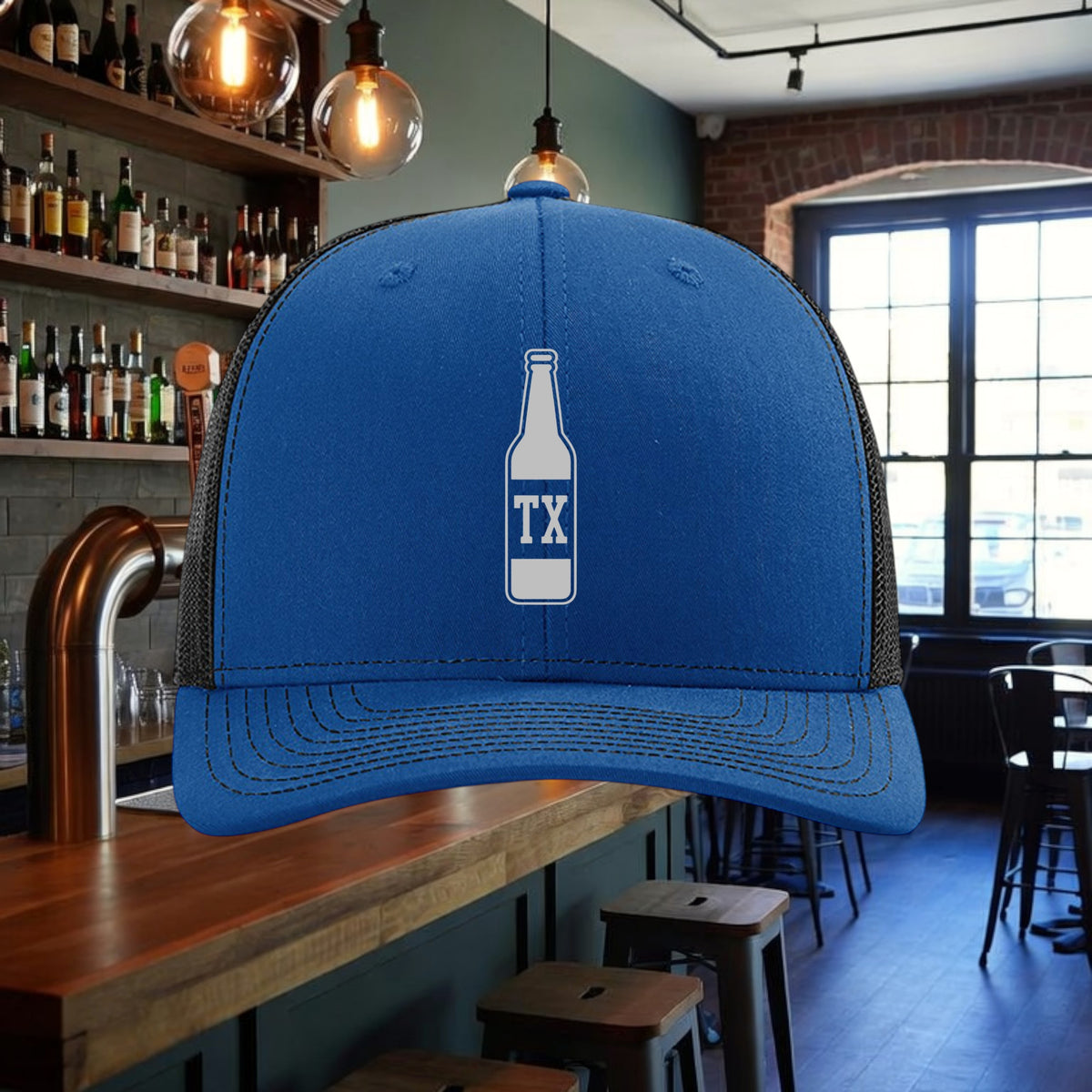 Better Grab A Beer blue and black mesh trucker hat with a white TX bottle graphic on the front panel