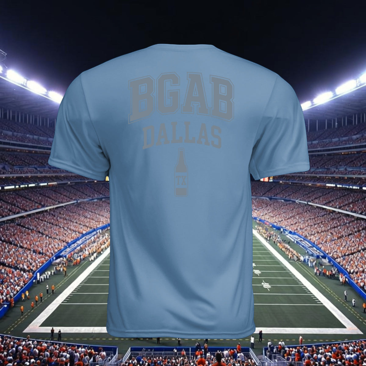 Better Grab A Beer light blue performance crew neck t-shirt with BGAB Dallas logo, back view in a stadium setting.