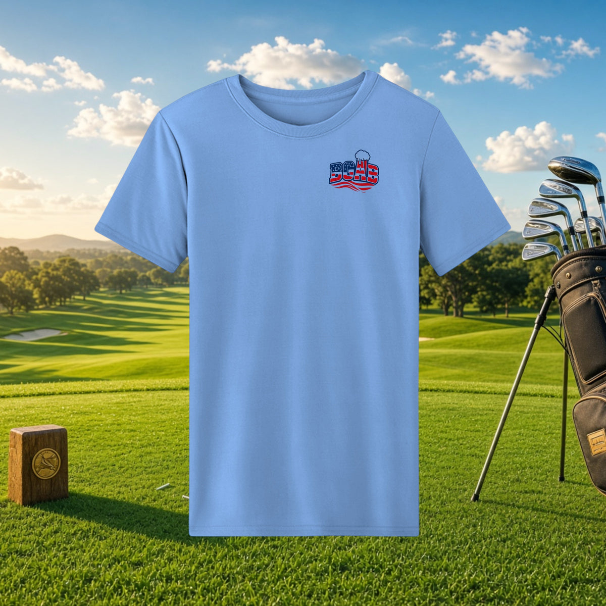 Better Grab A Beer light blue performance t-shirt with BGAB logo on a golf course background.