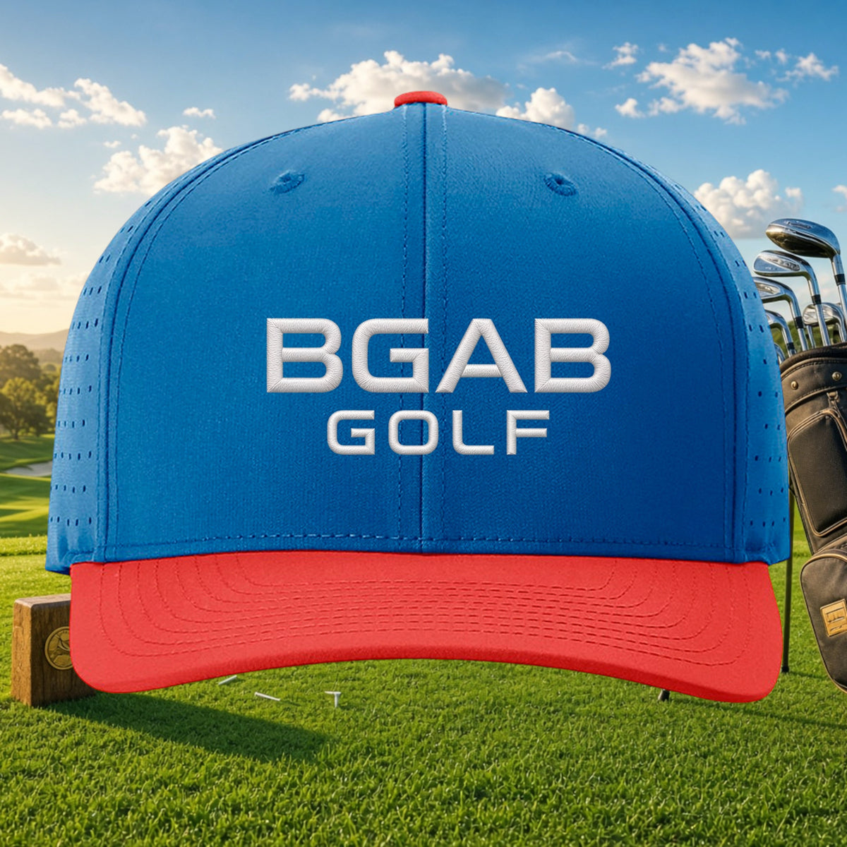 Better Grab A Beer blue and red BGAB GOLF performance cap with laser-cut ventilation on a golf course background