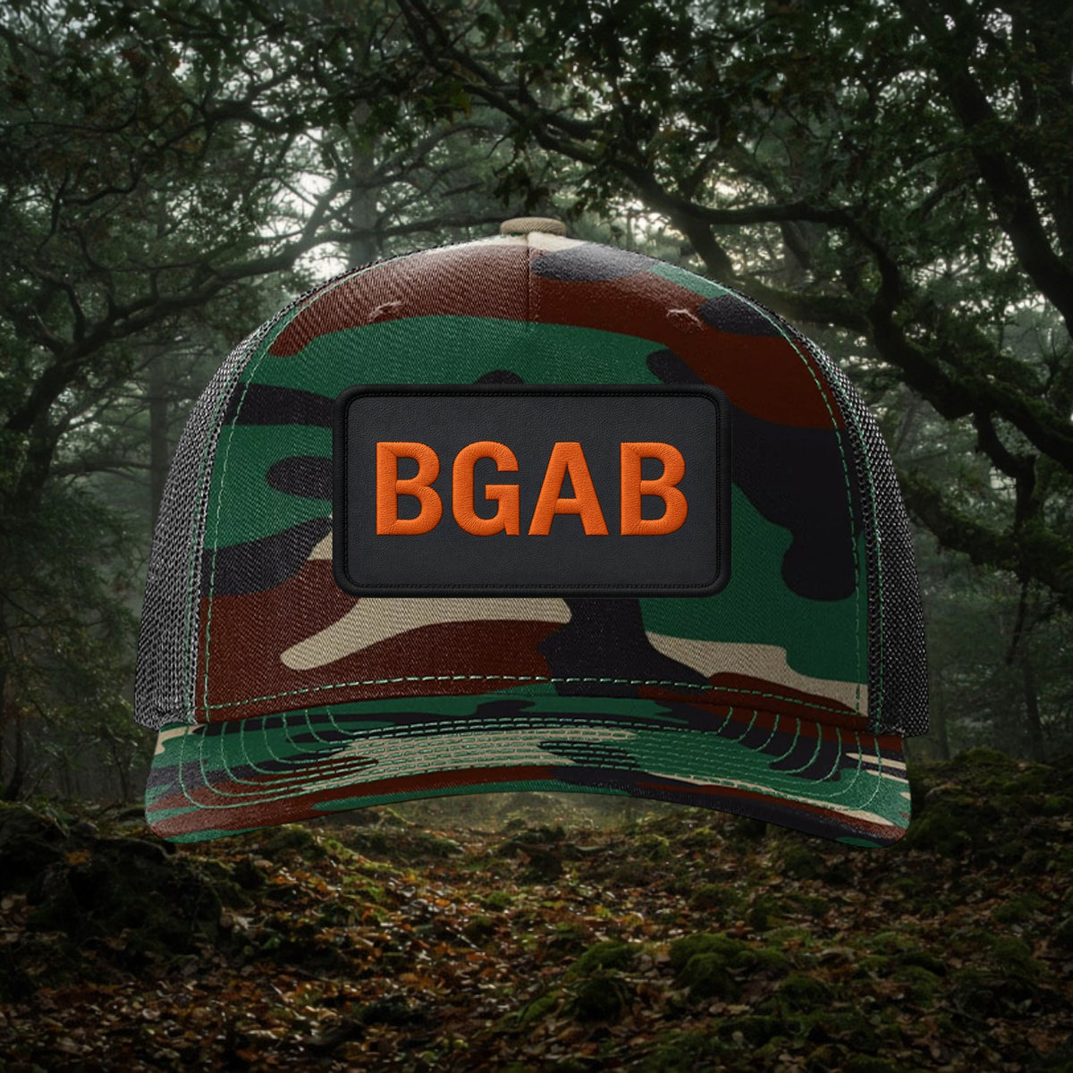 Better Grab A Beer green camo trucker cap with a black patch featuring orange BGAB text and a mesh back