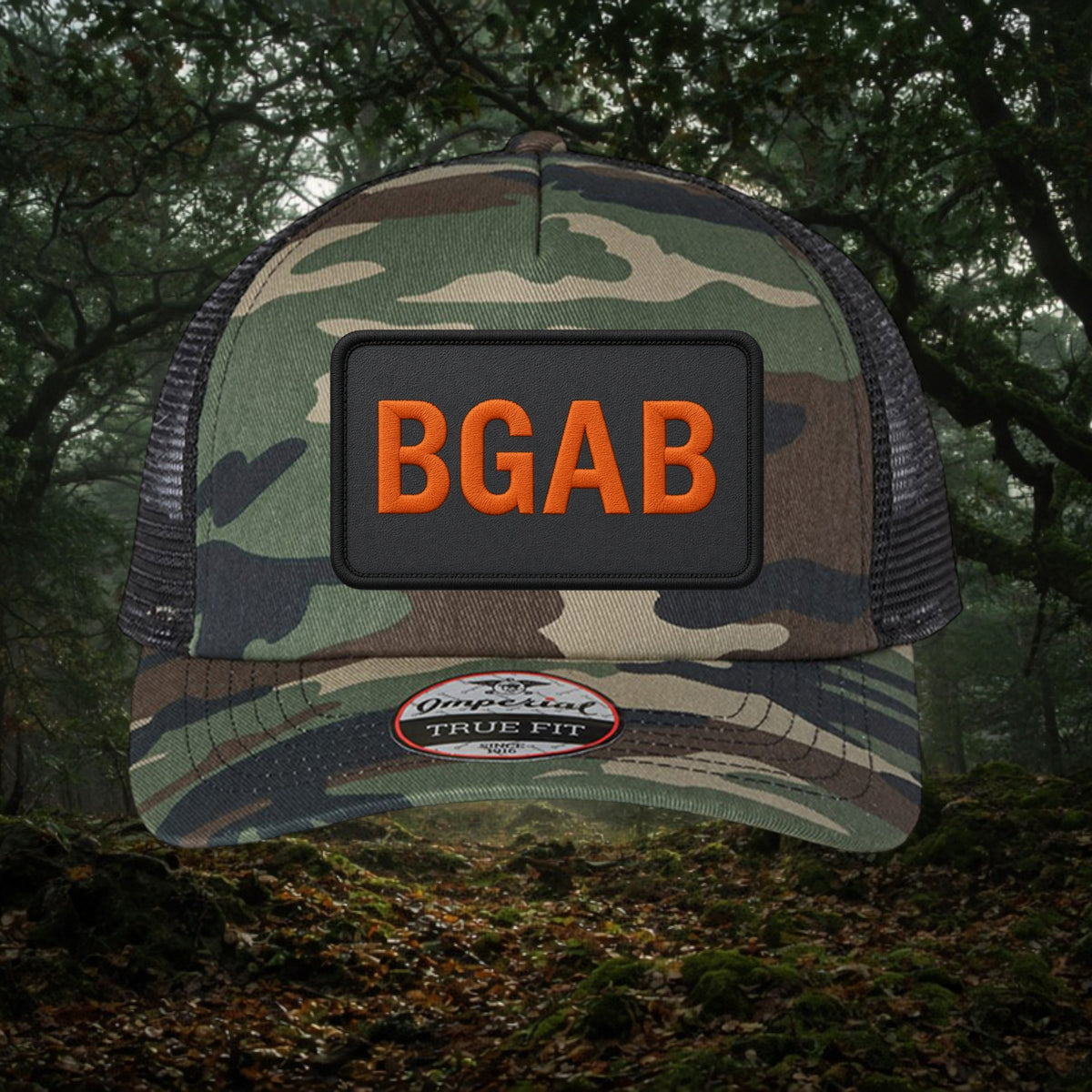 Better Grab A Beer camouflage trucker hat with black mesh back, structured five-panel design, and orange BGAB logo.