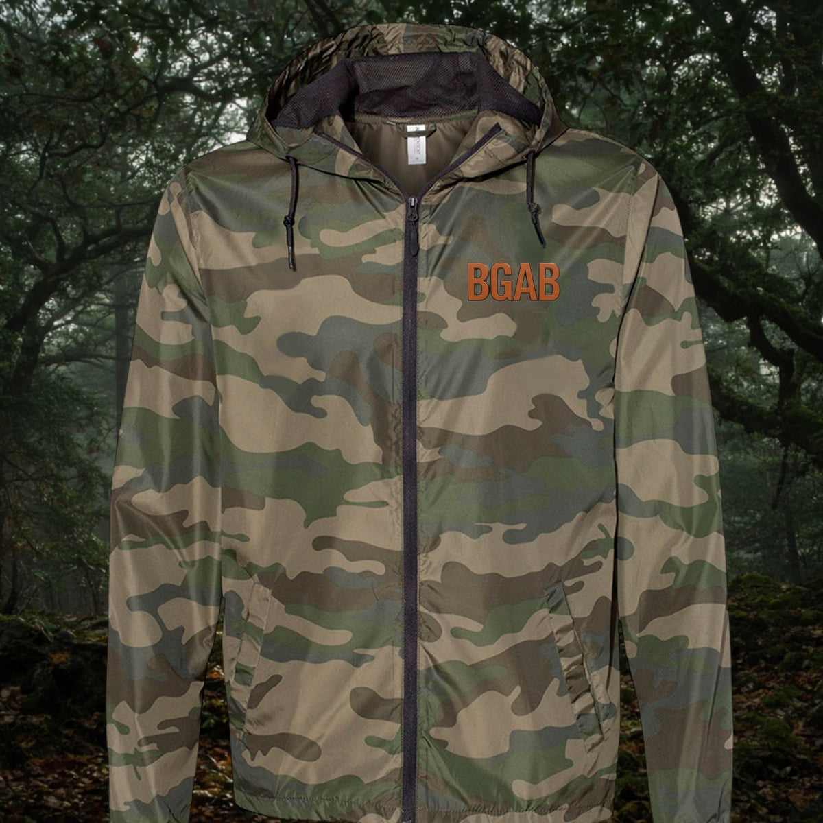 Better Grab A Beer lightweight camo windbreaker with orange BGAB logo, scuba neck, and water-resistant polyester.