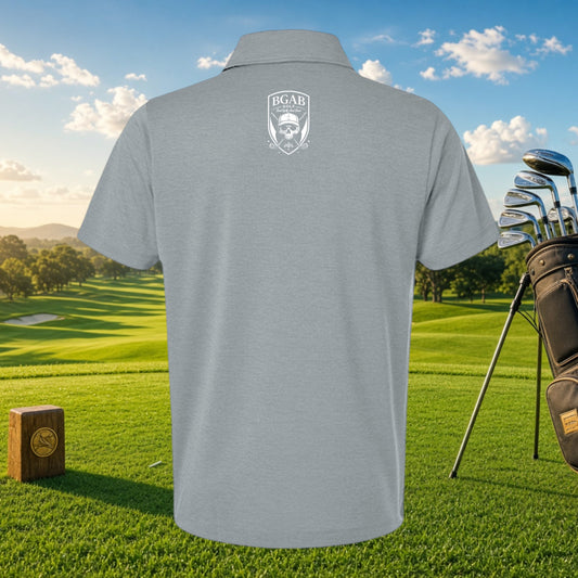 Better Grab A Beer grey polyester golf polo featuring a white skull logo on the back, set on a sunny golf course.