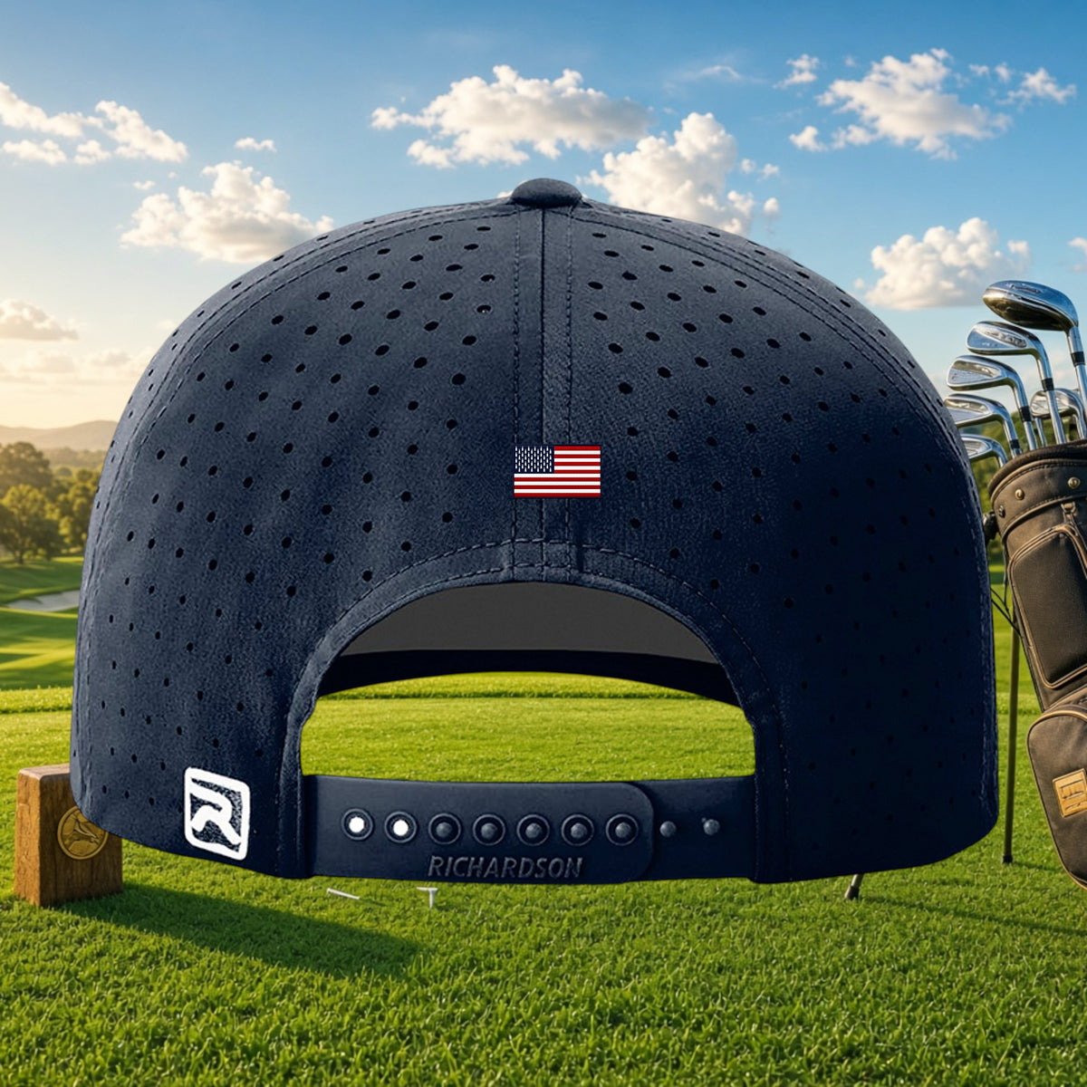 Better Grab A Beer navy blue laser-perforated golf cap with US flag detail and snapback closure on a golf course