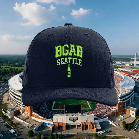 Better Grab A Beer navy trucker hat with green BGAB Seattle bottle logo, featuring a structured six-panel design.