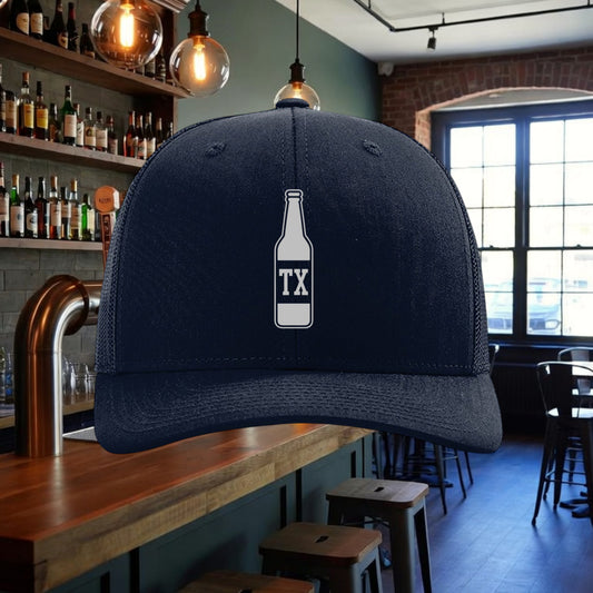 Better Grab A Beer navy blue six-panel trucker hat with a white TX bottle graphic and adjustable snapback closure.