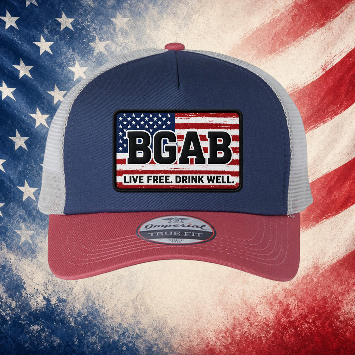 Better Grab A Beer patriot flag trucker hat with navy front, red visor, and mesh back featuring a BGAB logo patch.