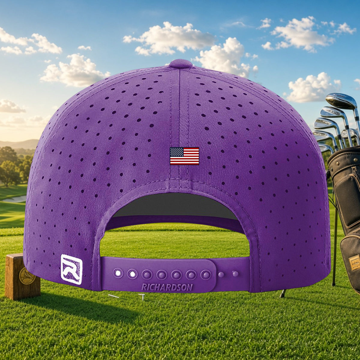 Better Grab A Beer purple performance golf cap with laser-cut perforations, snapback closure, and US flag detail.