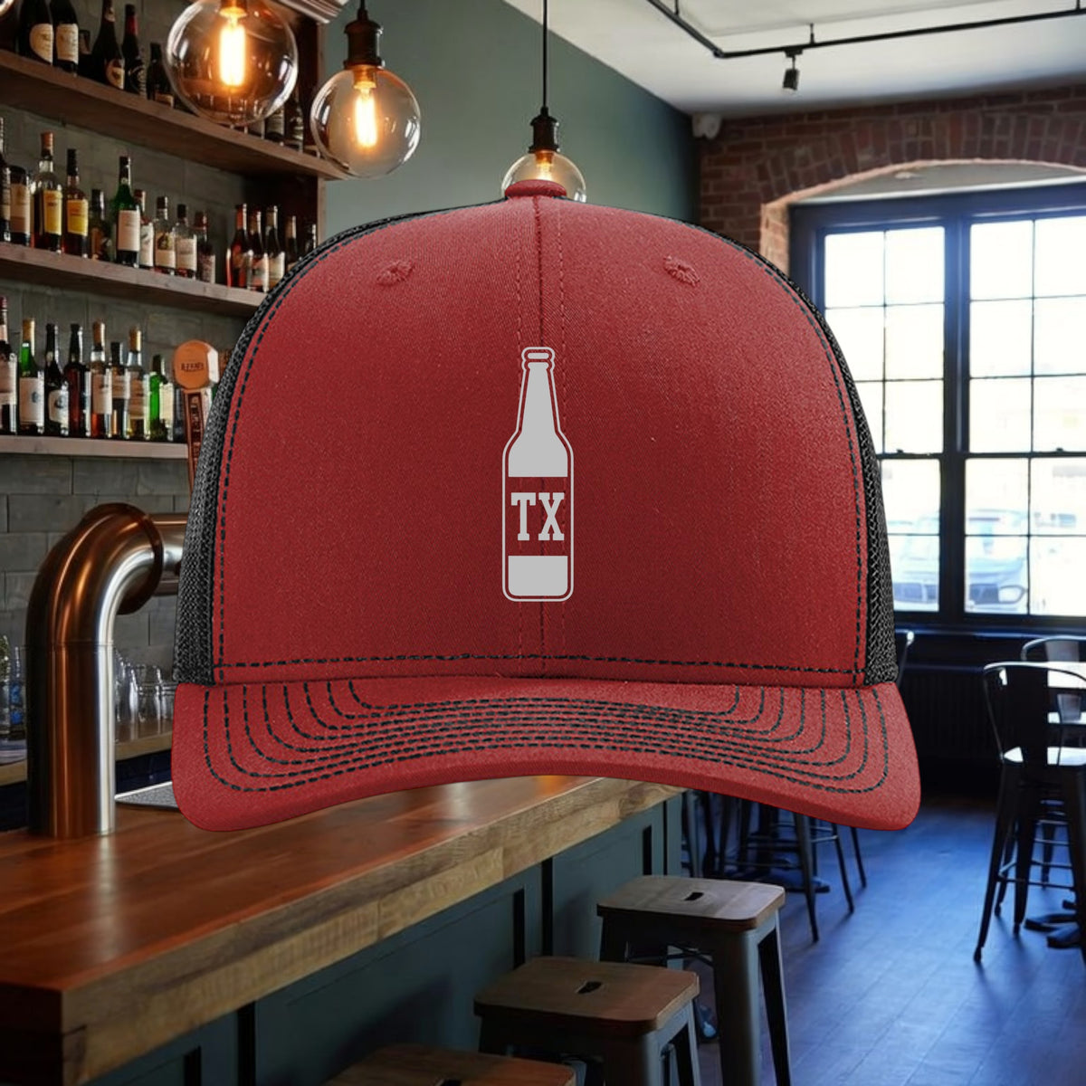 Better Grab A Beer red and black six-panel trucker hat with a white TX bottle graphic and pre-curved visor