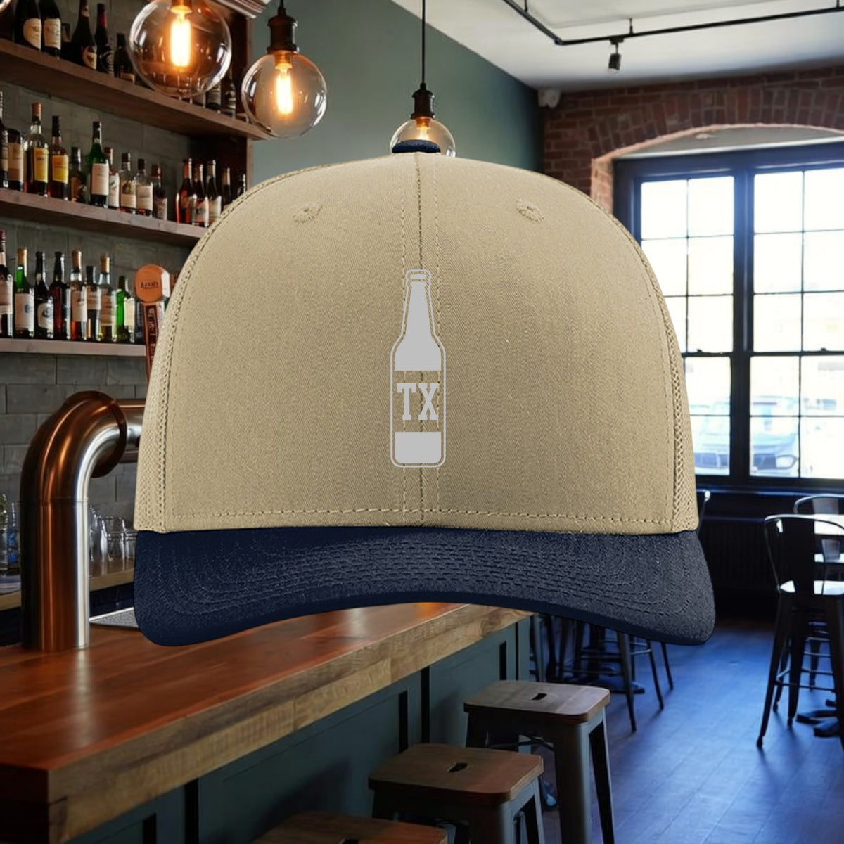 Better Grab A Beer TX Bottle trucker hat in khaki and navy with a structured six-panel design and snapback closure.