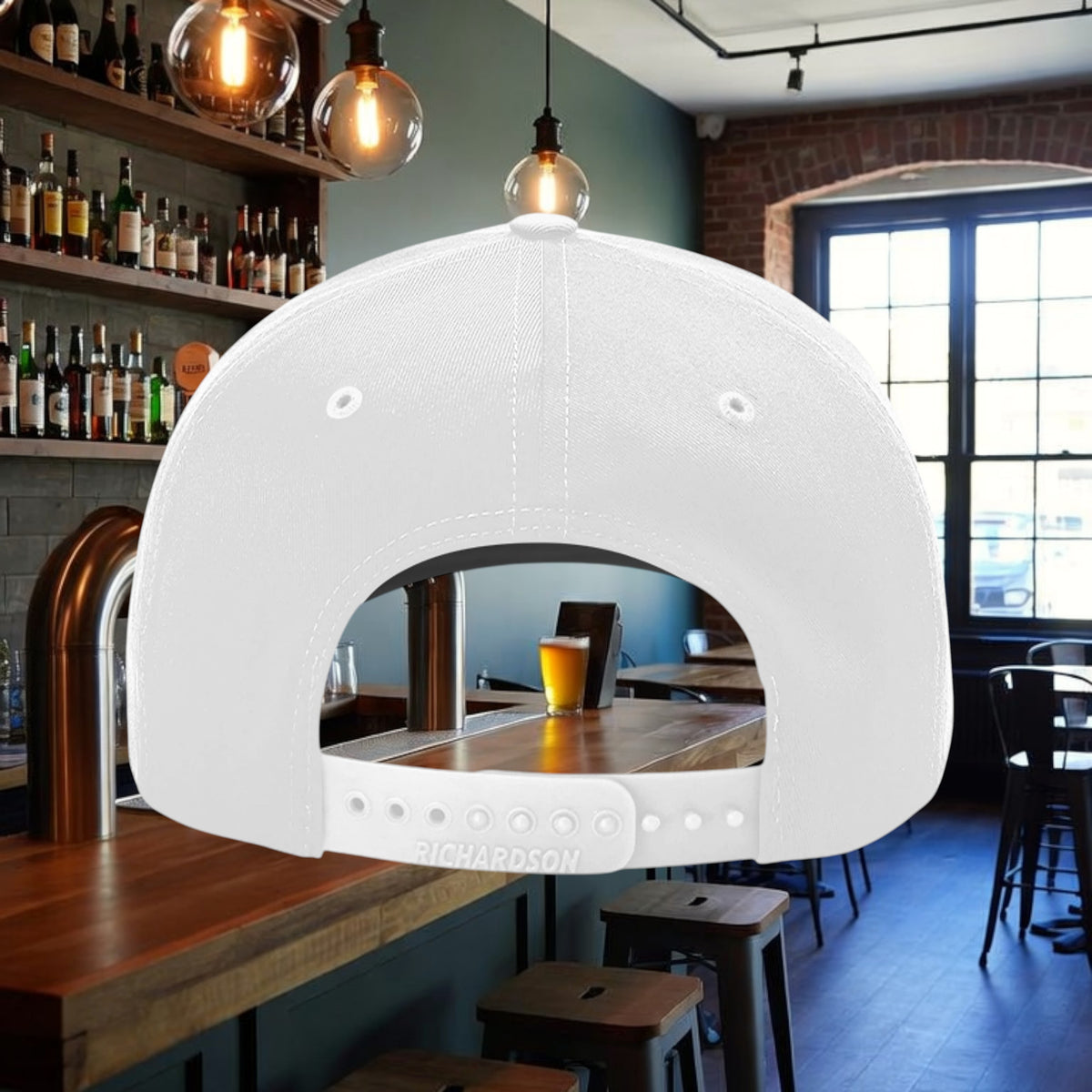 Better Grab A Beer white structured six-panel snapback hat with adjustable closure, back view in a bar setting
