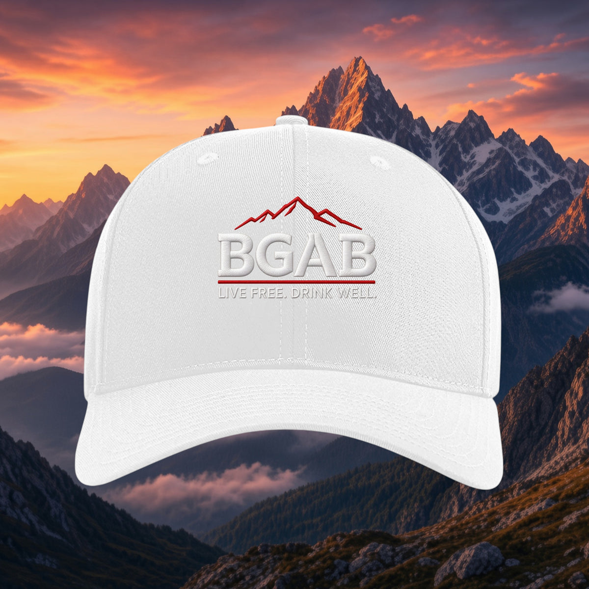 Better Grab A Beer white six-panel twill snapback cap with red mountain logo embroidery against a mountain sunset