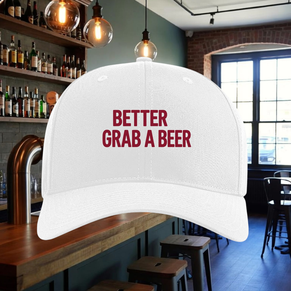 Better Grab A Beer white six-panel structured twill snapback hat with red text in a bar setting